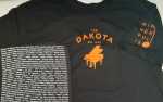  Dakota Unisex T-Shirt - Orange Piano on Black T-Shirt - Many Artists listed on back of tshirt
